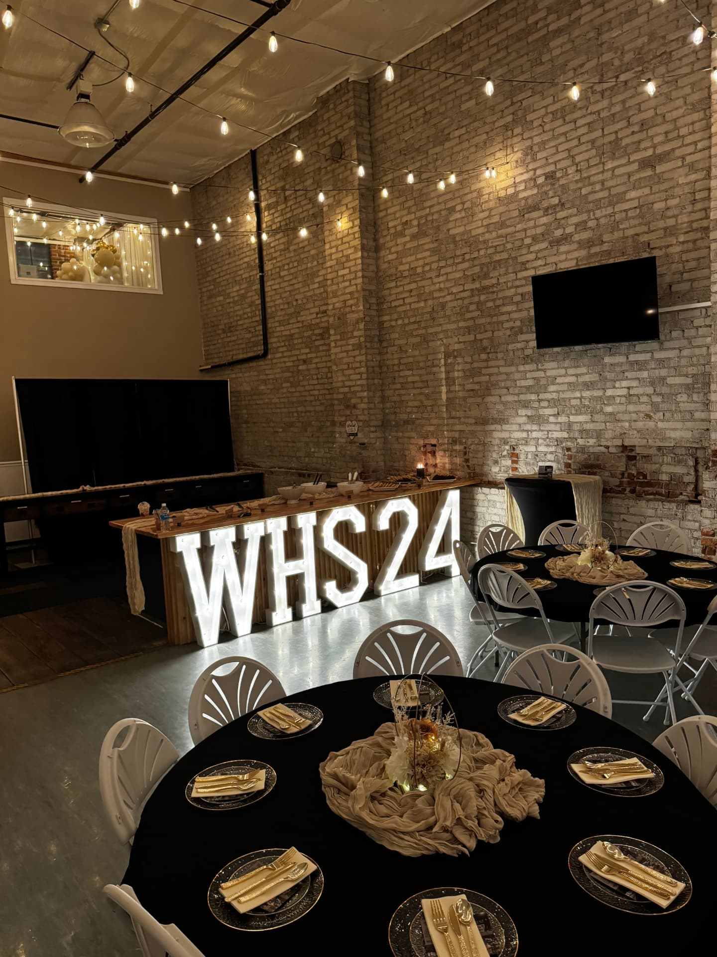 Round tables arranged for a formal event at Host Wenatchee