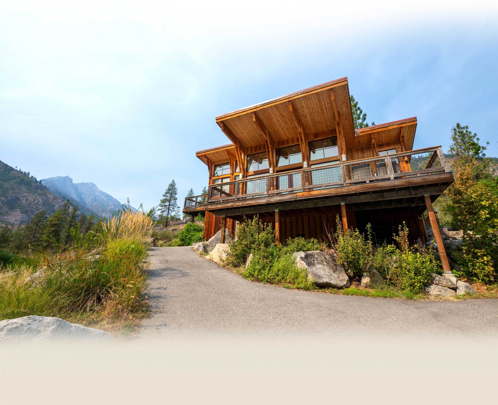 Wood lodge at Sleeping Lady Mountain Resort beneath the Icicle Canyon mountains