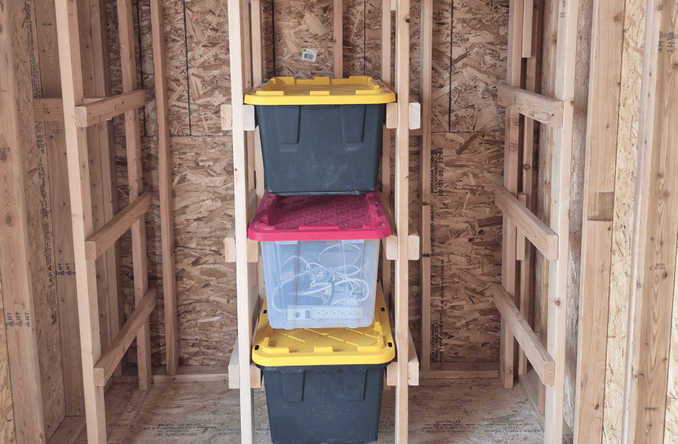 Custom storage shelving built into a framed structure by Frame 2 Finish
